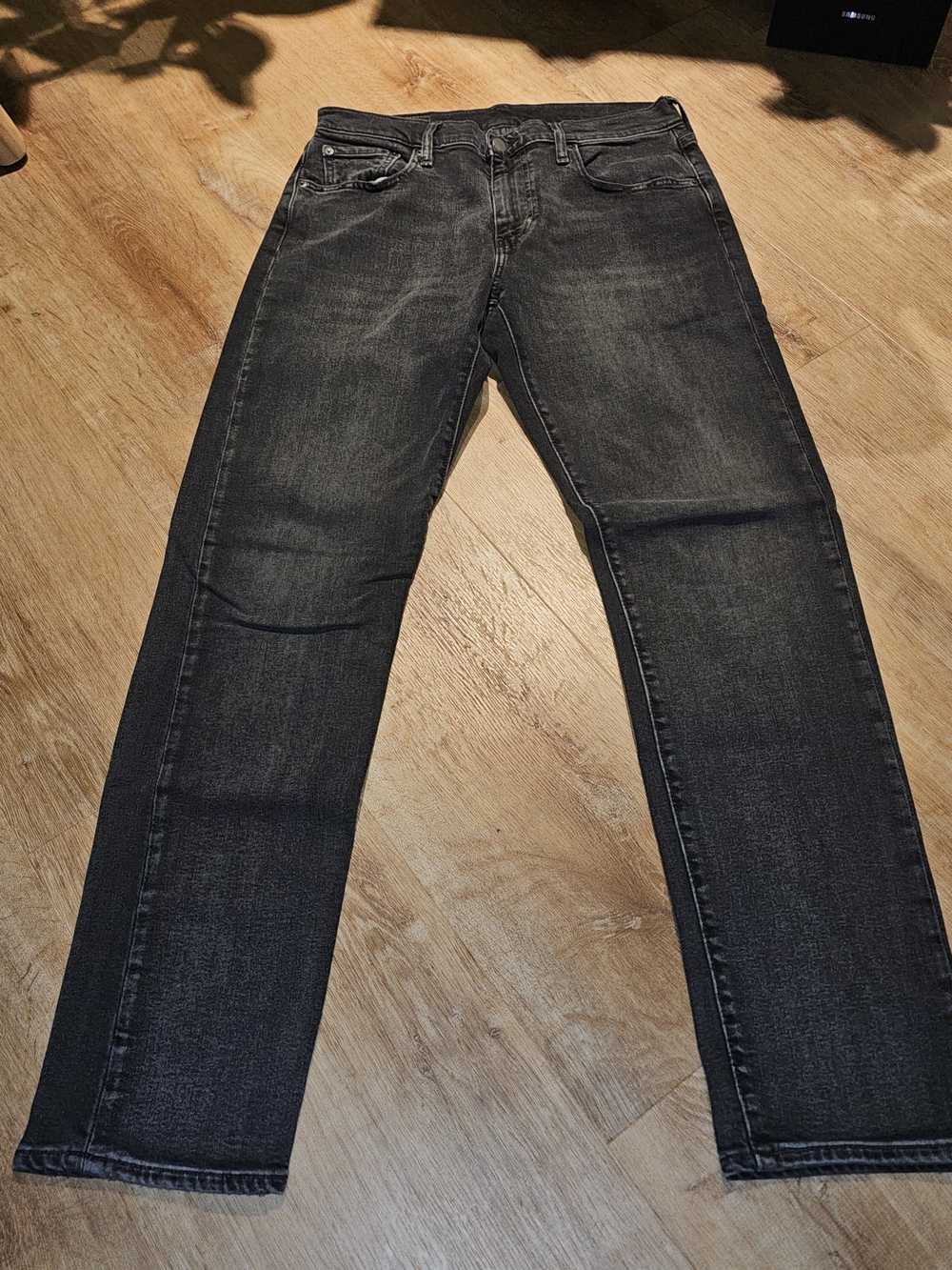 Levi's Premium 502 Taper Jeans in a washed dark grey 30x32 mens NWOT